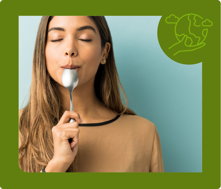 woman licking her spoon 