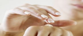 Moisturizer being applied to hands