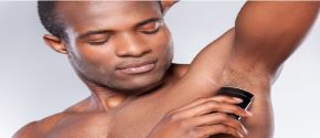 Man applying deodorant